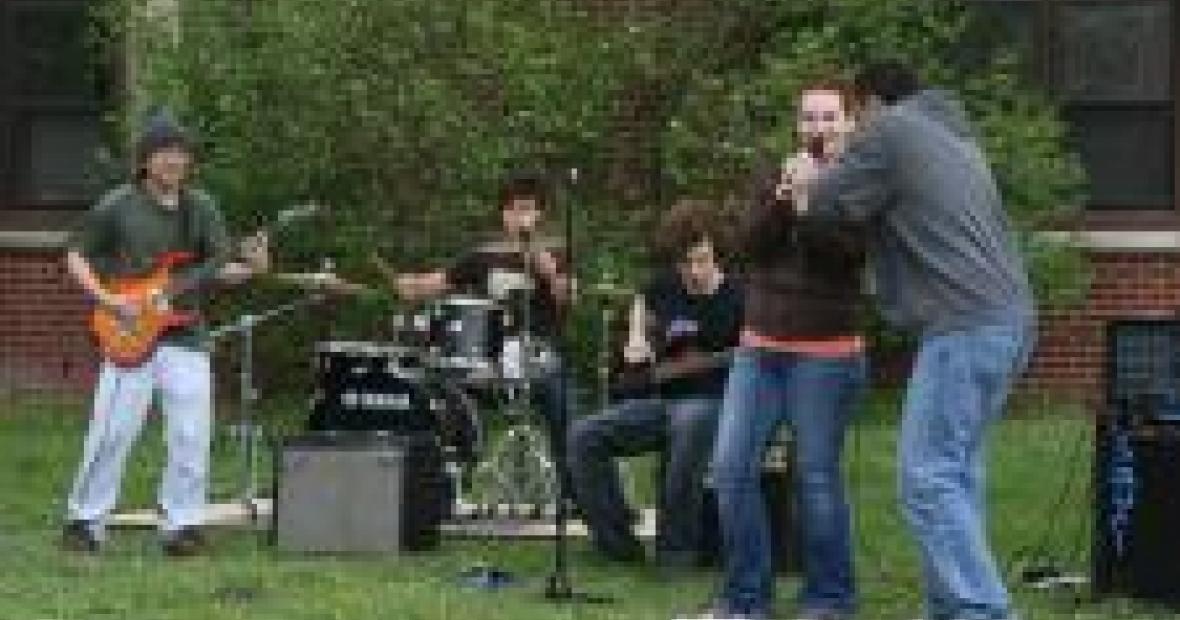 A student band performs outside
