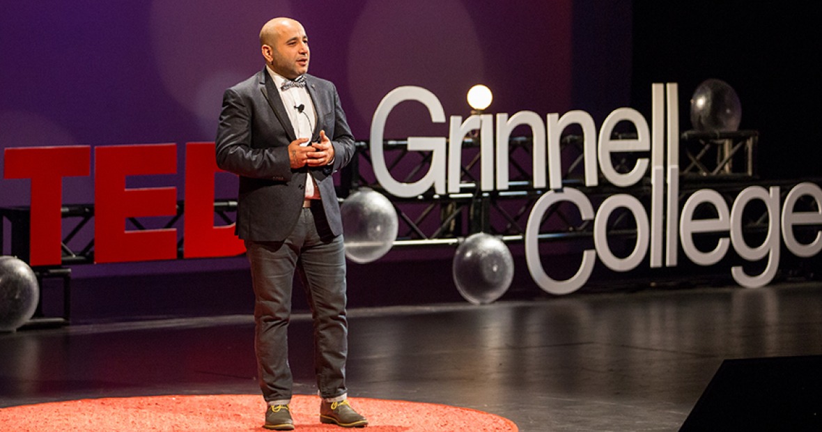A speaker gives a TEDxGrinnellCollege talk.