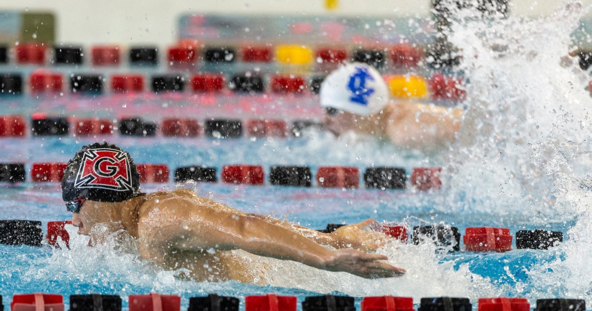 swimmer competing in the pool