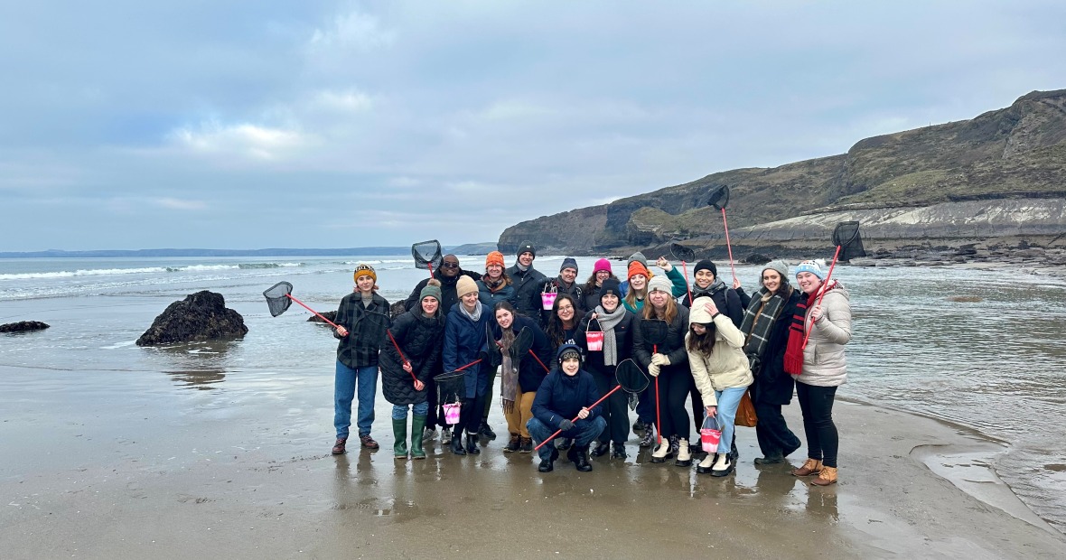 Garbed in hats, gloves and scarves and carrying long handled nets and buckets, GIL group engages in rockpooling safari in Wales