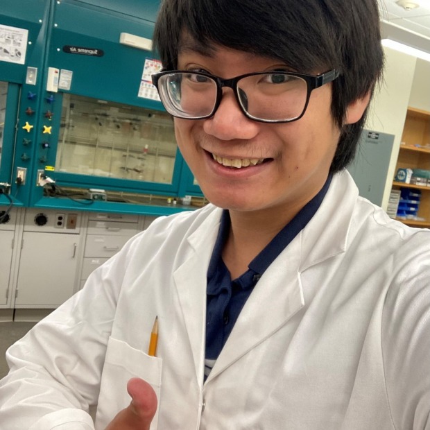 Hieu Nguyen in a lab coat 