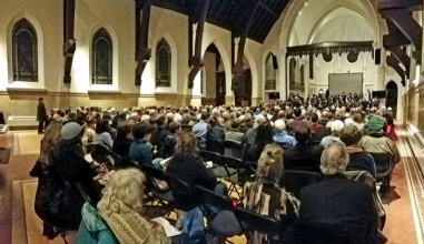 The Grinnell Singers performing with Lyra Baroque Orchestra to a full house in St. Paul