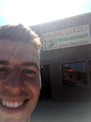 Henry Bolster selfie in front of Choung Garden, Grinnell, Iowa