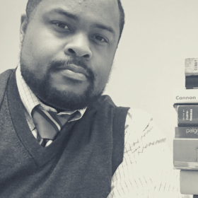 Image of Darrius D. Hills, a religious studies associate professor at Grinnell College