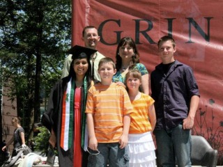 Sneha Saigal ’12 with her American host family on graduation day