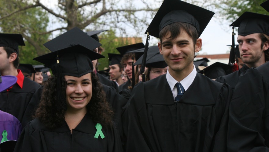 Students posing for a graduation photo