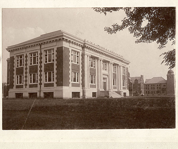 Exterior of Carnegie Library, Grinnell, when it was a solitary building, showing white decorative stonework 