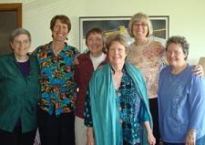 group of women smiling at camera