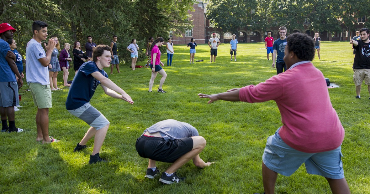 Students outside playing a lawn game during PCPOP