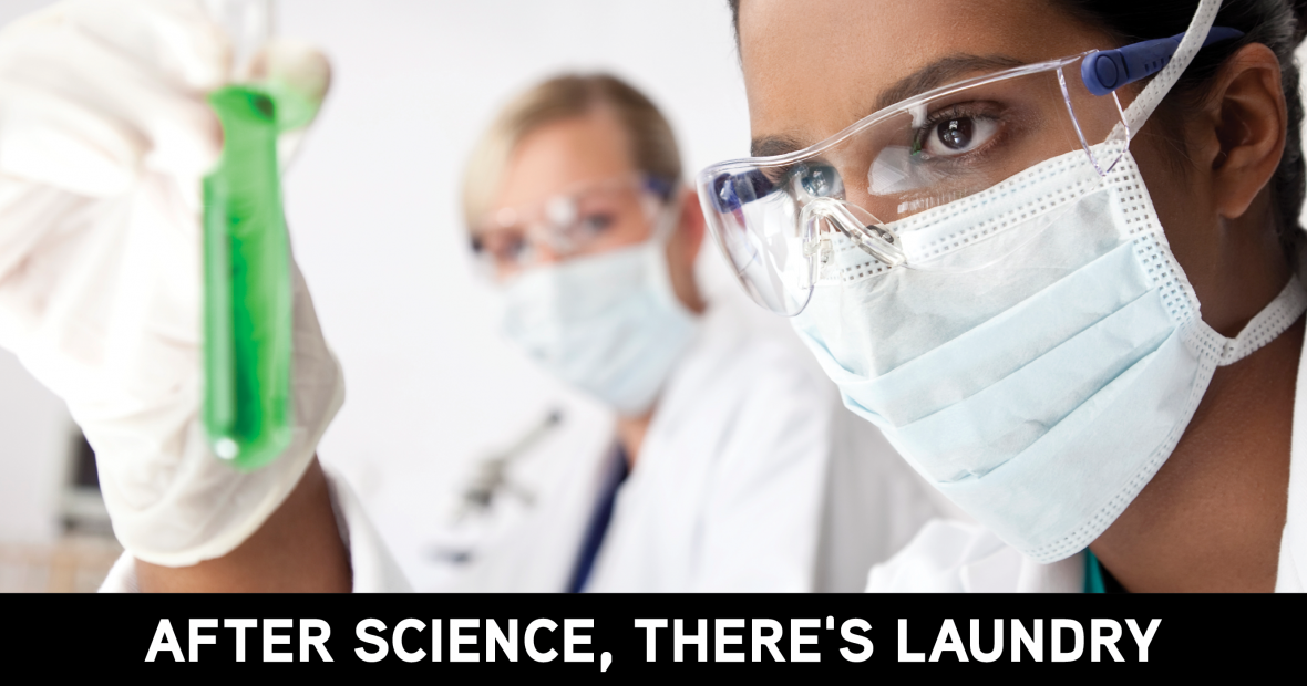 After science, there's laundry: image of scientist in lab wear looking at test tube