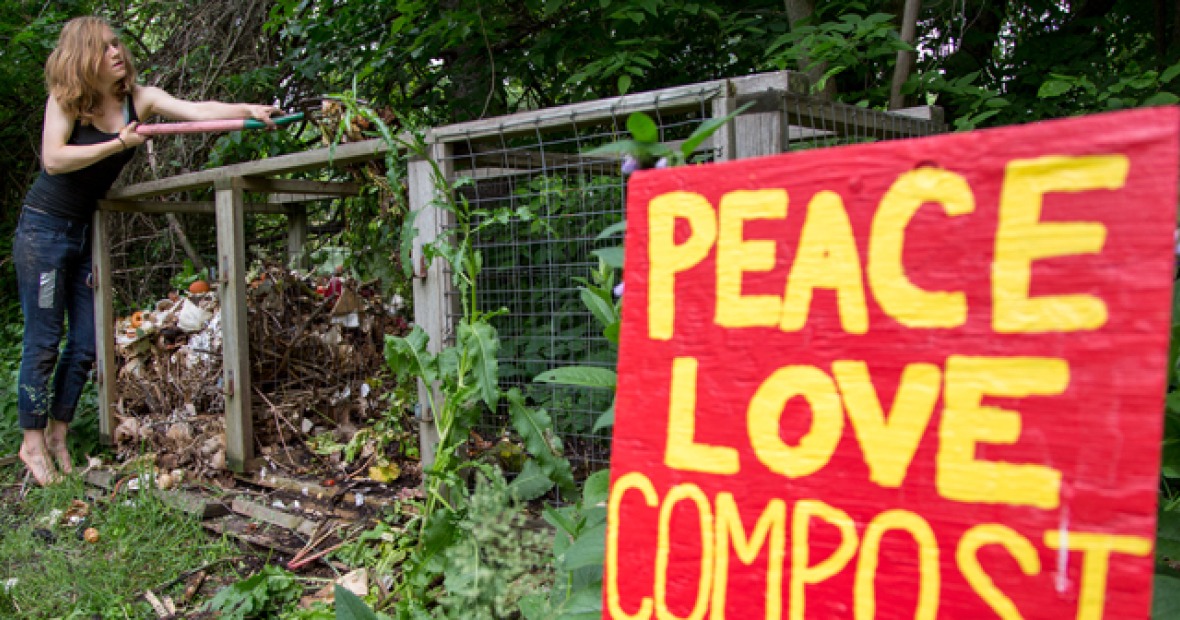 compost pile with "Peace Love Compost" sign