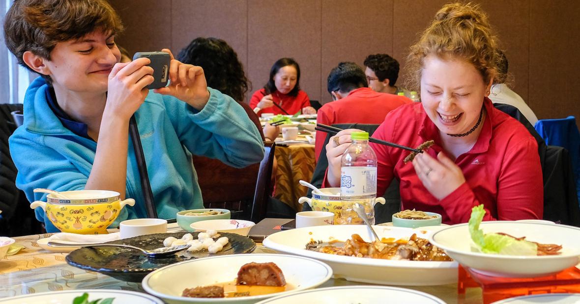 Students enjoy food in China