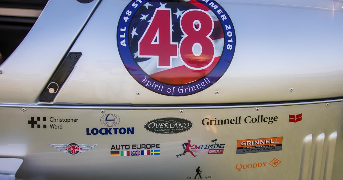 The side of Will Freeman's three-wheeler, with sponsors and logos
