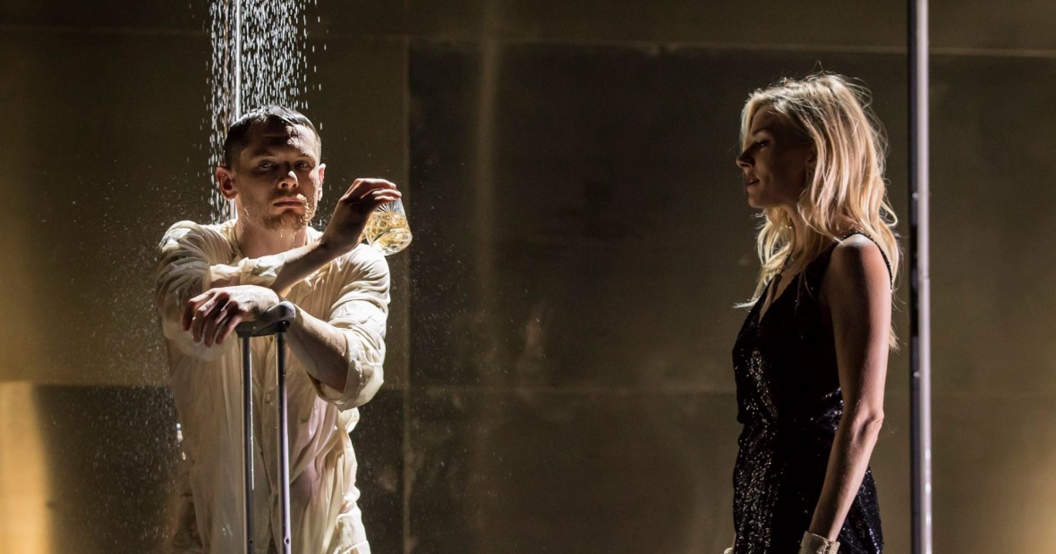 Man under shower with woman watching (scene from Cat on a Hot Tin Roof)