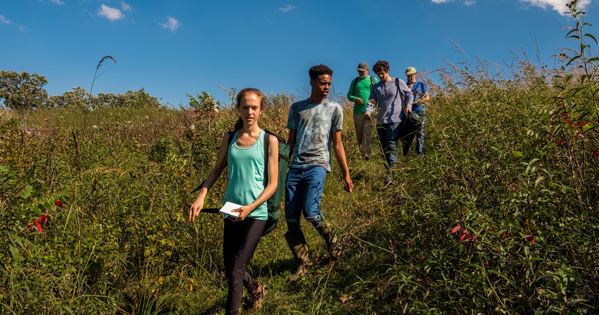 Vince Eckhart and 4 students walk through Conard Environmental Research Area