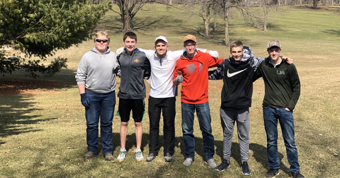 Grinnell High School boys golf team pose at golf course for cleanup 