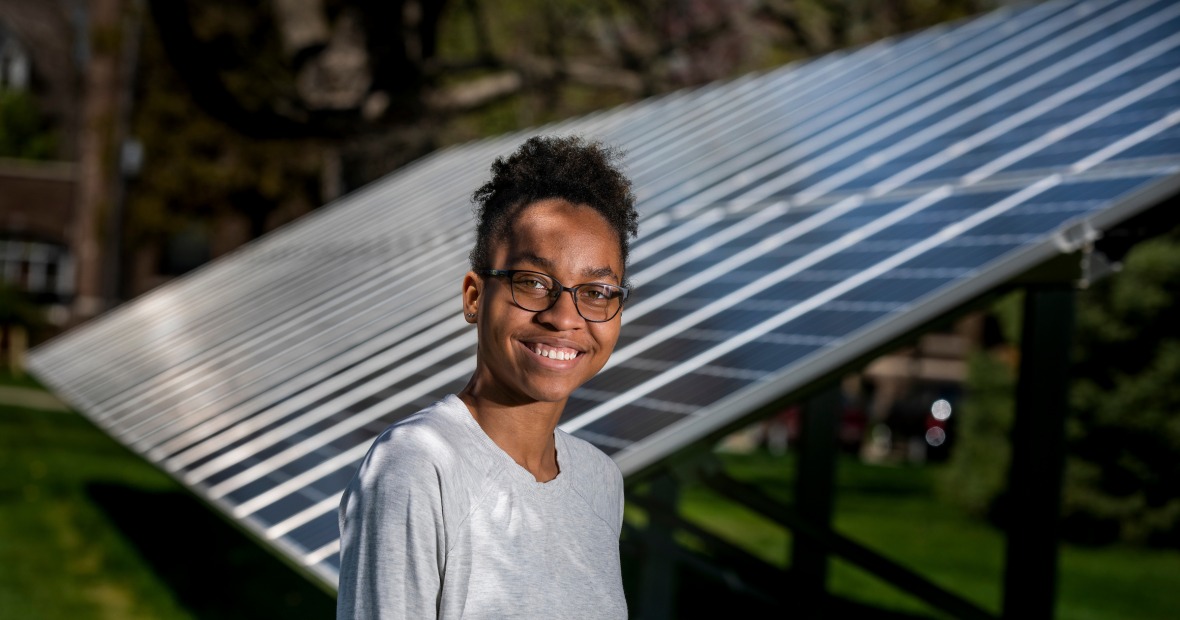 Avery Barnett near the College’s solar panels on the east side of campus. 