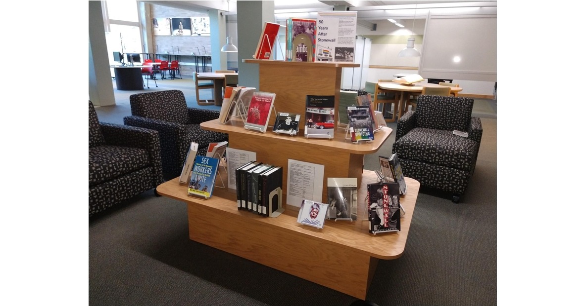 Display of books and media celebrating 50 Years After Stonewall riots