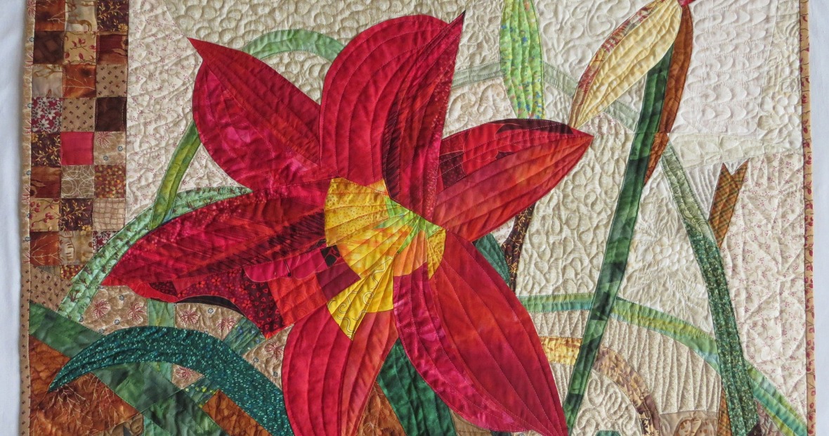 Quilt with red flower