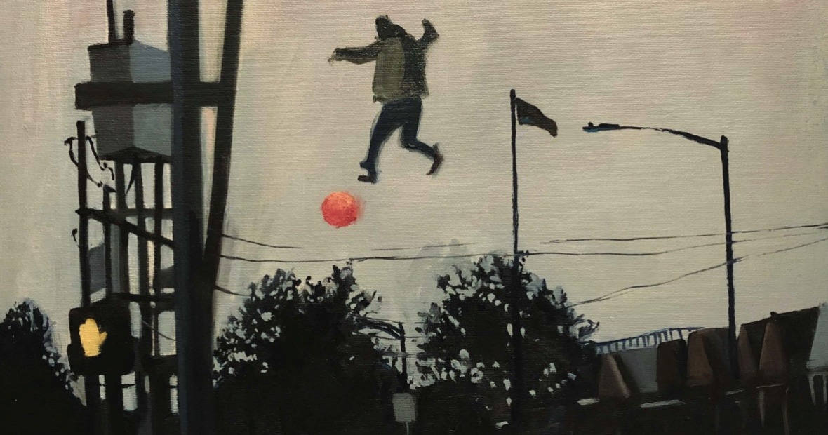 Man in air with ball