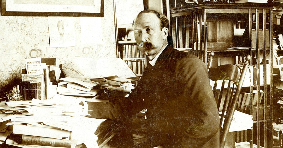 President George Gates in his office