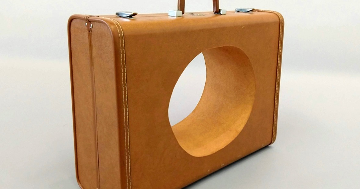 suitcase with hole 