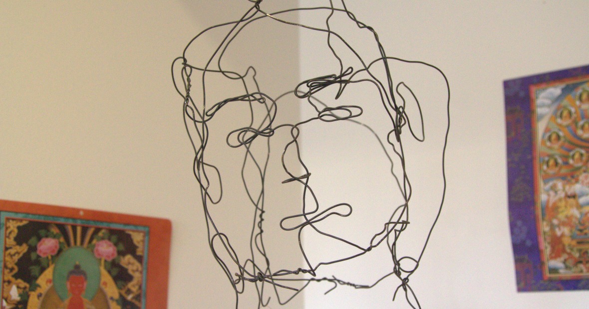 An artwork of a head constructed with wire