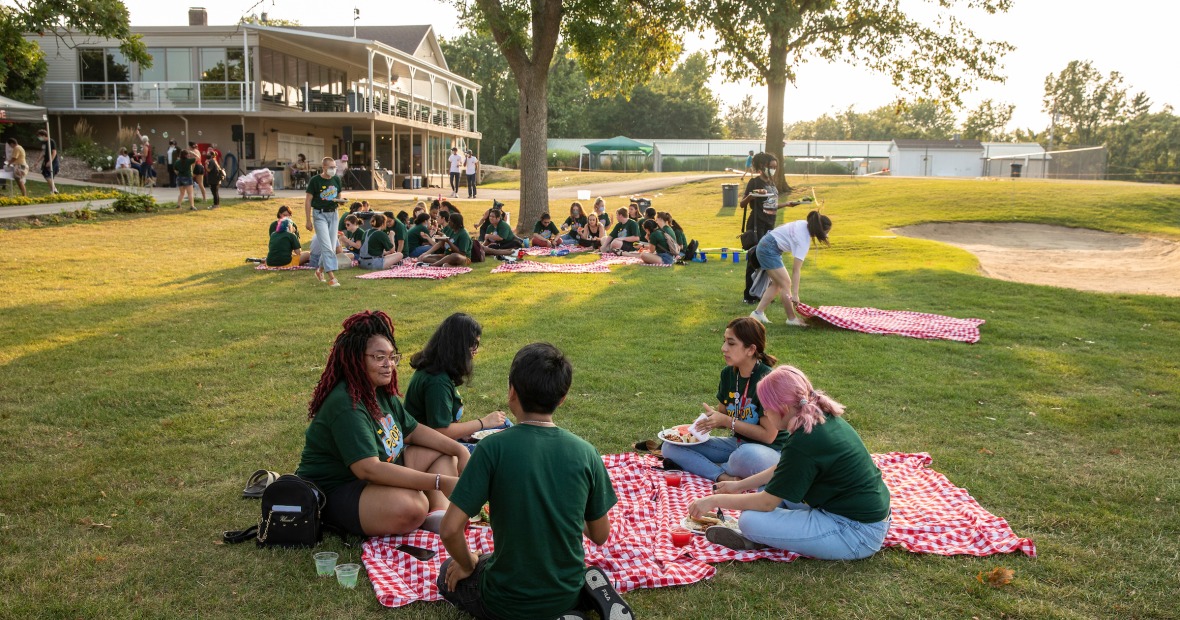 students having a picnic at the golf course 