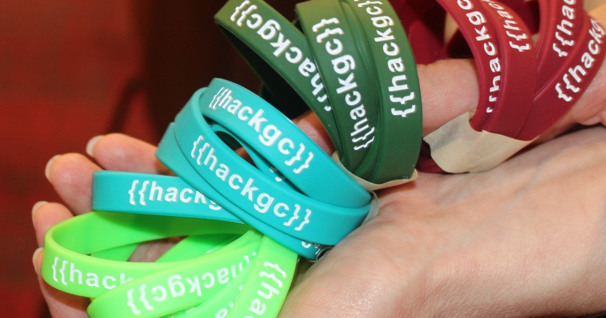hackGC is stamped on colored silicone wristbands for team solidarity.