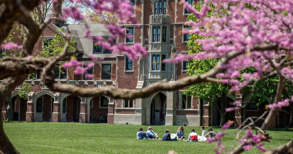 Grinnell's Gates Rawson Tower with pink spring blooms