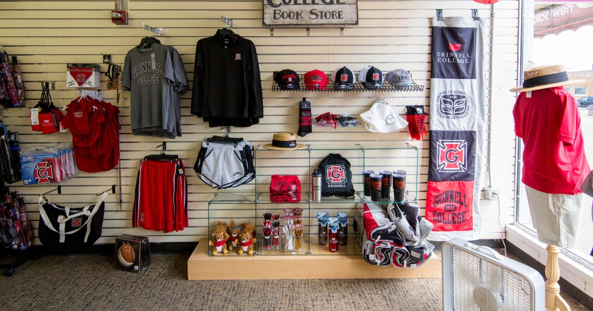 bookstore display with clothing, good branded as Grinnell College