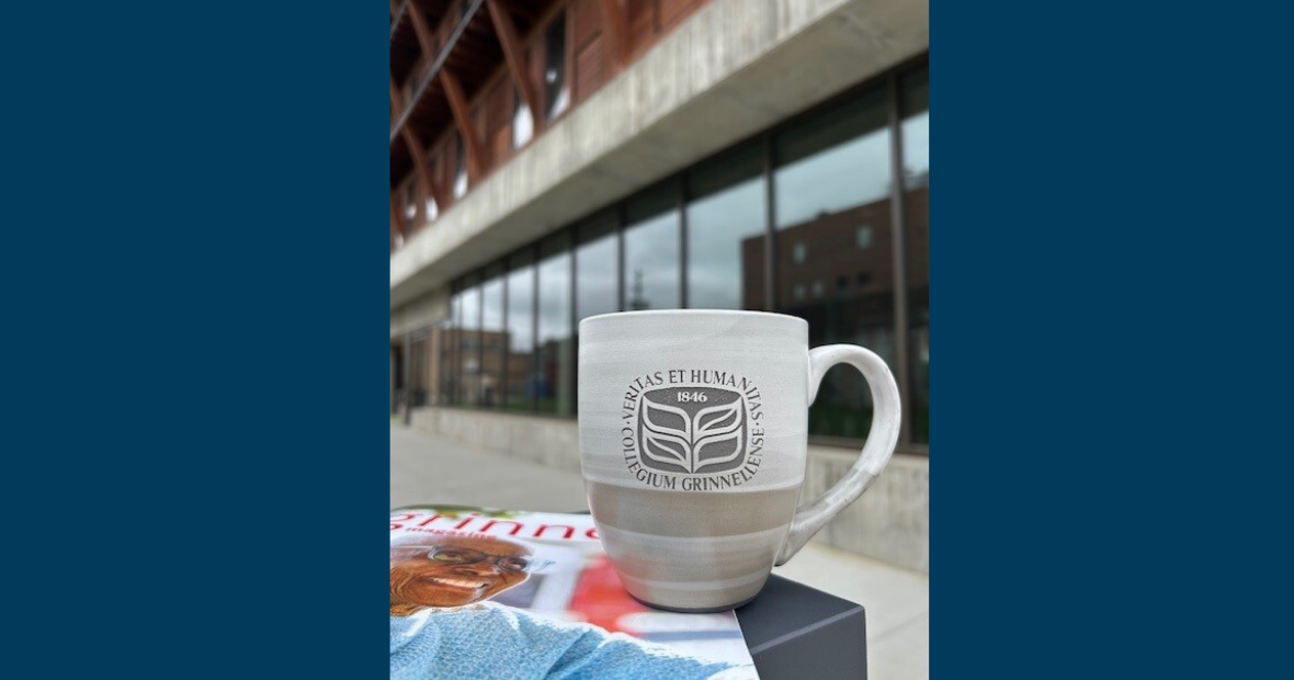 coffee cup in front of building