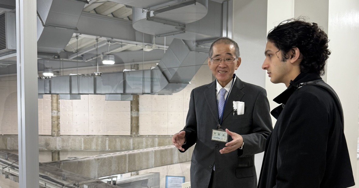 Budhil Thijm, ’25 listens to staff at Arakawa Recycling Center