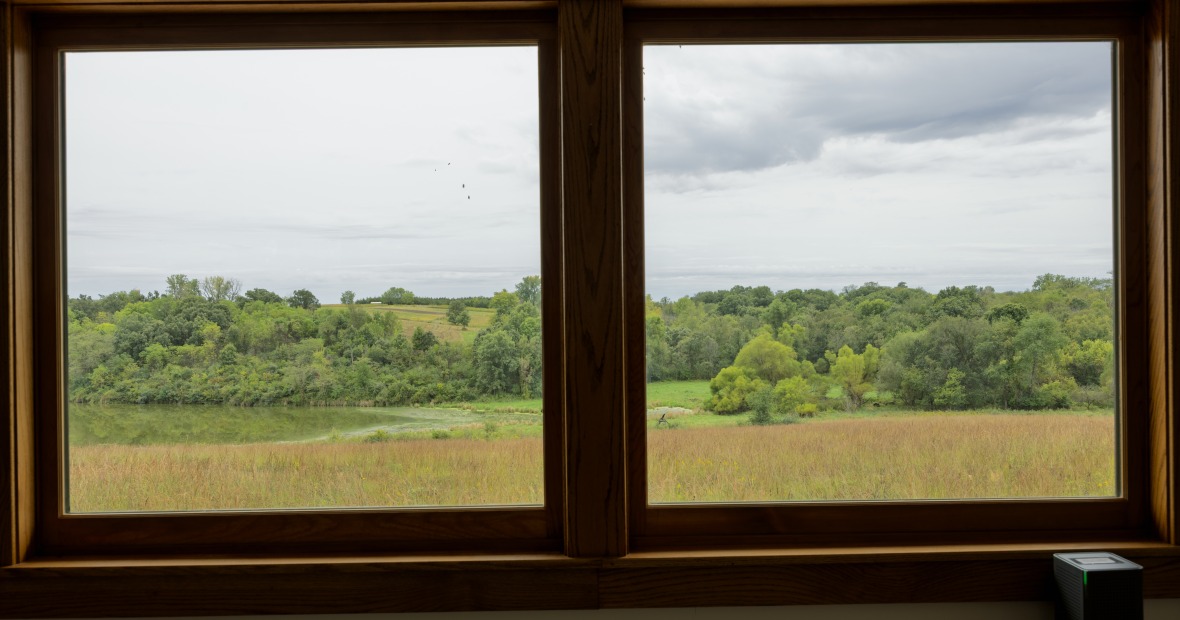 The view through the west-facing windows onto the rolling landscape of CERA
