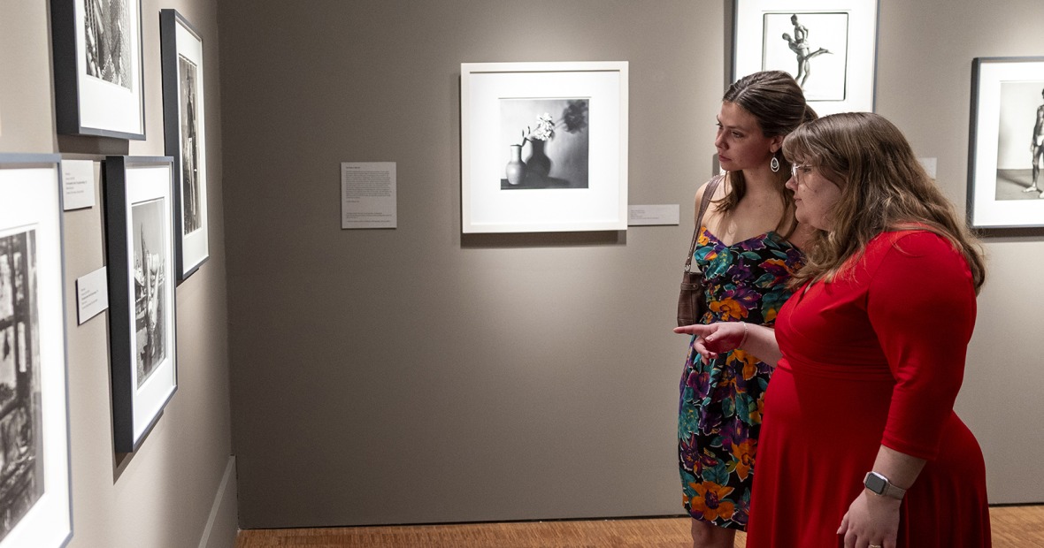 students looking at art in gallery