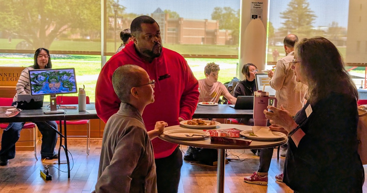 Attendees enjoying lunch at the tech fair