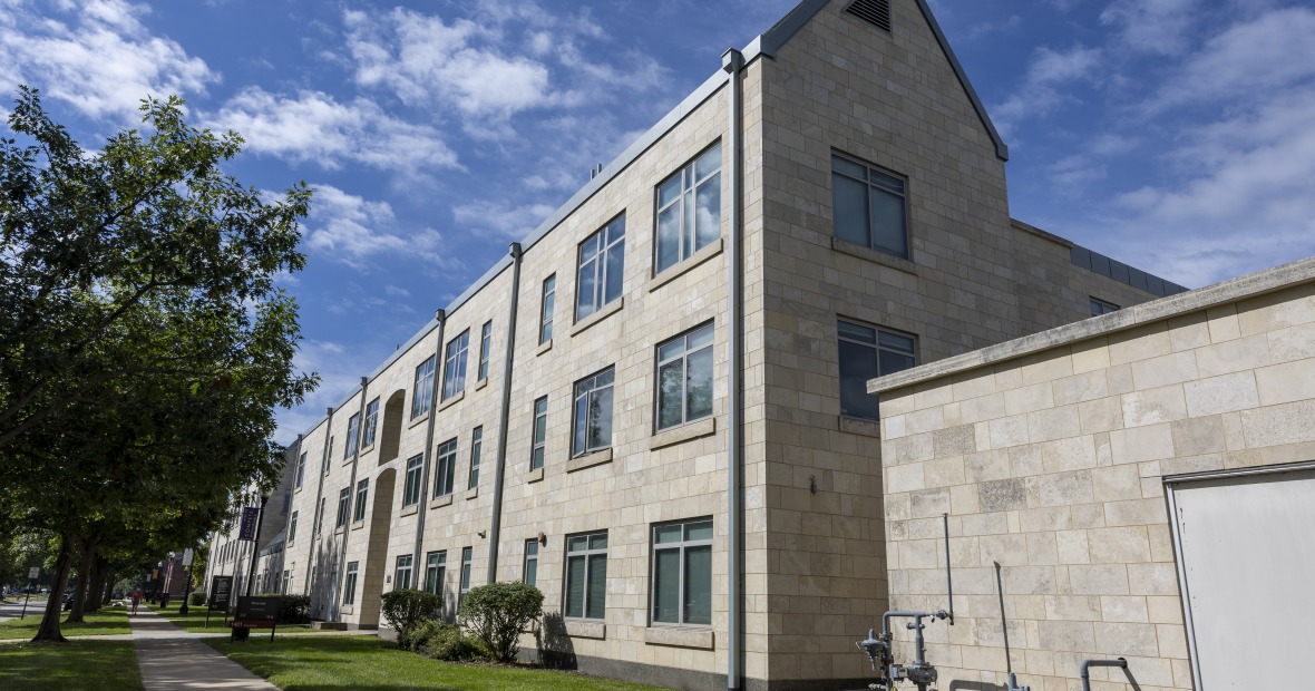 Rose Hall is a three-story concrete building.
