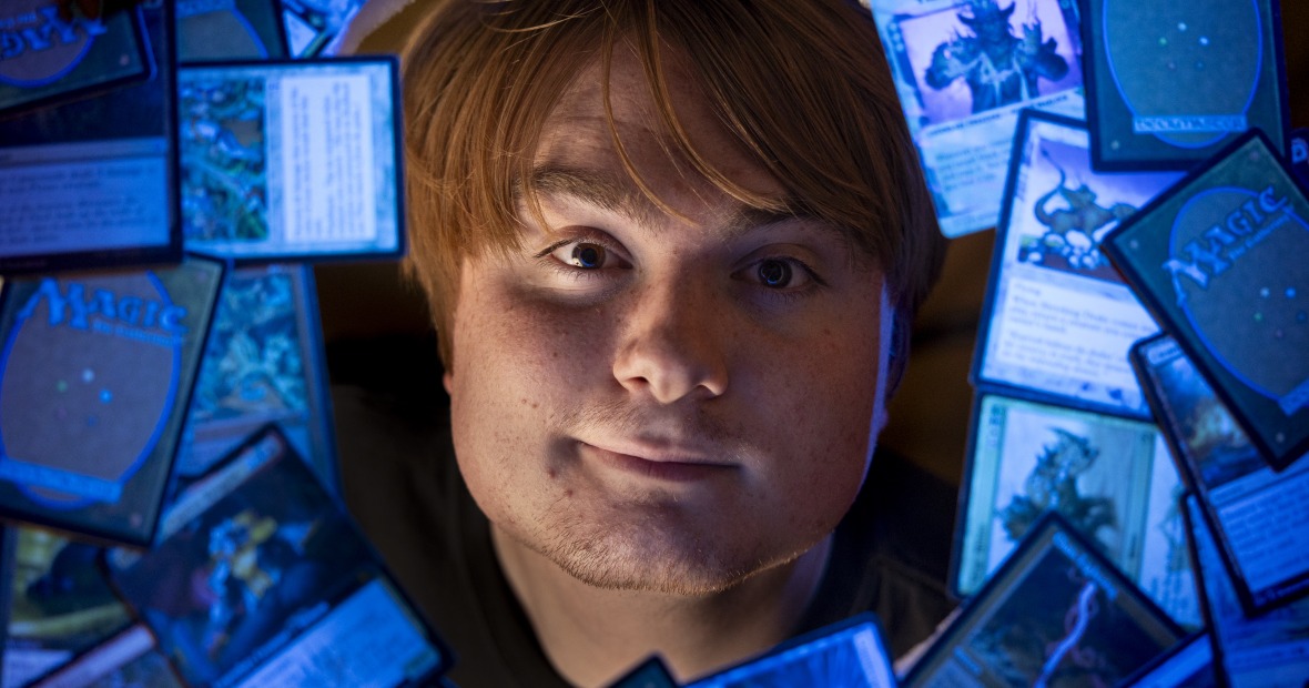 student with cards around and blue background