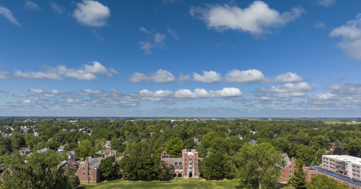 Bird's eye view of Mac Field, Gates Tower, and the city of Grinnell.