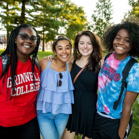Smiling students on center campus