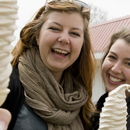 Two students hold ice cream cones at Dari Barn