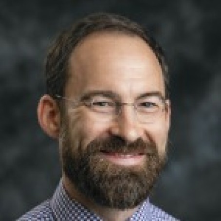 Headshot of Caleb Elfenbein