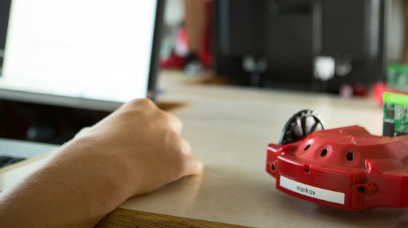 Student works on code in robotics lab