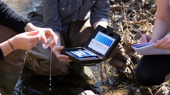 Students taking water samples out at CERA