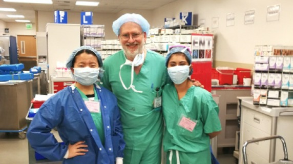 Image of externs Ruilin Yu and Juliet Torres with their host Neal Fleming. 