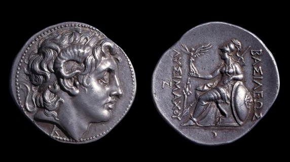 Two sides of an ancient coin: a third-century BCE coin depicting, on one side, Alexander the Great as the Egyptian god Amun and, on the other, the Greek goddess Athena holding the goddess Nike (Victory)