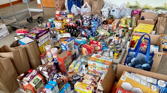 Room full of food donations to MICA