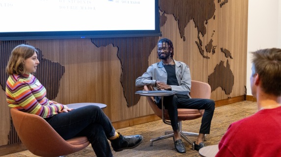 two adults lead an information session presentation
