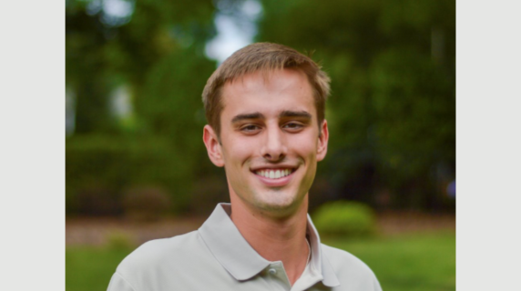 James Snyder smiles for a headshot