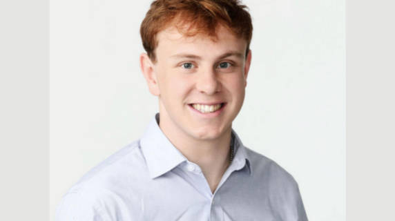 Jonah Tillman smiles for a headshot